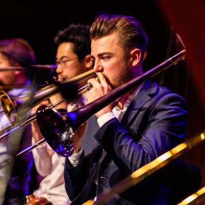 Trombonists performing in Big Band